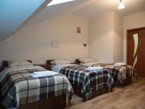 Postel nebo postele na pokoji v ubytování City Hostel