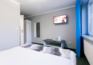 Postel nebo postele na pokoji v ubytování Pokoje Beskid Brenna