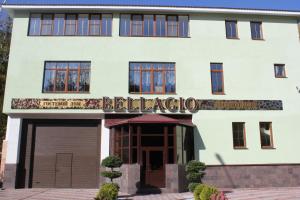 a white building with a sign that reads berkeley at Guest House Bellagio in Tolyatti