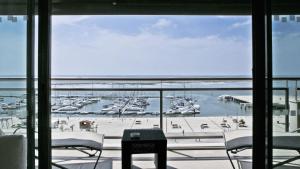 a view of a marina with boats in the water at Real Marina Hotel & Spa in Olhão