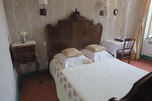Postel nebo postele na pokoji v ubytování Le Domaine de Fraissinet