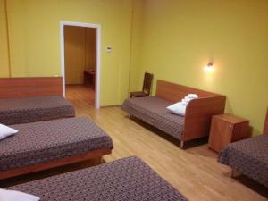 Postel nebo postele na pokoji v ubytování Hotel Nova