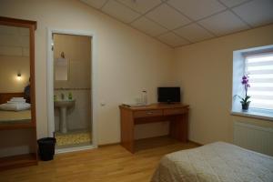 TV a/nebo společenská místnost v ubytování Hotel Nova