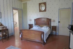 Postel nebo postele na pokoji v ubytování Le Domaine de Fraissinet
