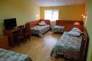 Postel nebo postele na pokoji v ubytování Hotel Nova