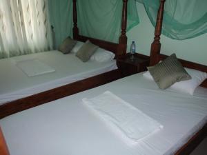 Giường trong phòng chung tại Rock Villa Relax City Home