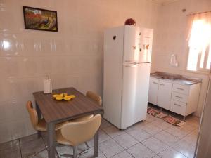 Virtuvė arba virtuvėlė apgyvendinimo įstaigoje Apartamento dos Altos Centro Gramado