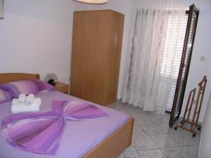 Postel nebo postele na pokoji v ubytování Apartments Murgic