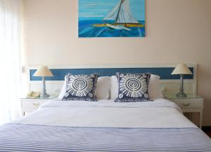 Cama ou camas em um quarto em Hotel San Martin