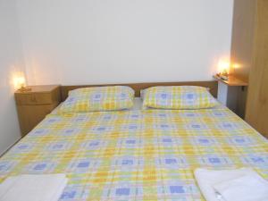 Postel nebo postele na pokoji v ubytování Apartments Murgic
