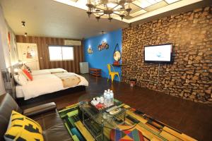 Postel nebo postele na pokoji v ubytování First Place B&B (Hualien Railway Station)