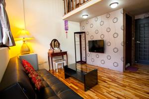TV a/nebo společenská místnost v ubytování Miaoli Sanyi Bo Wu Guan Homestay