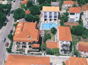 an aerial view of a house with orange roofs at Theodora Studios & Apartments in Skala