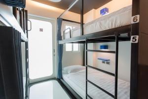 Postel nebo postele na pokoji v ubytování BearPacker Patong Hostel + 37 fotografií