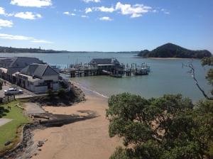 an aerial view of a dock on a body of water at Panorama Heights Apartment in Paihia