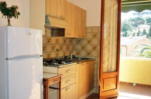Η κουζίνα ή μικρή κουζίνα στο Appartamenti Marilise
