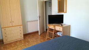 TV a/nebo společenská místnost v ubytování Albergo Le Rose