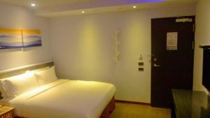 Postel nebo postele na pokoji v ubytování Macchi Hotel - Taipei