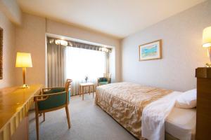 Postel nebo postele na pokoji v ubytování Seaside Hotel Maiko Villa Kobe