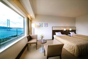 Postel nebo postele na pokoji v ubytování Seaside Hotel Maiko Villa Kobe