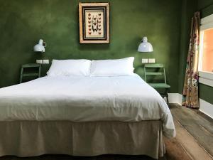 Ένα ή περισσότερα κρεβάτια σε δωμάτιο στο B&B Cà Bianca dell'Abbadessa +117 φωτογραφίες