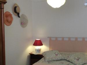 Posteľ alebo postele v izbe v ubytovaní Les Hauts du Baousset