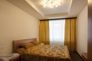 Voodi või voodid majutusasutuse Tsaghkahovit Hotel toas