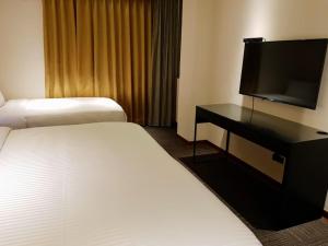 TV a/nebo společenská místnost v ubytování Macchi Hotel - Taipei