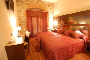 Postel nebo postele na pokoji v ubytování Hotel Los Usías + 37 fotografií