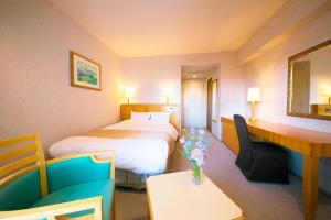 Postel nebo postele na pokoji v ubytování Seaside Hotel Maiko Villa Kobe