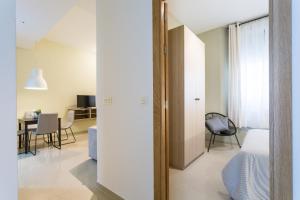 Postel nebo postele na pokoji v ubytování Apartamentos Diaber San Leandro