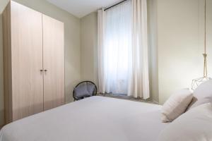 Postel nebo postele na pokoji v ubytování Apartamentos Diaber San Leandro