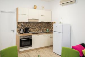 Nhà bếp/bếp nhỏ tại Apartments Sevilja