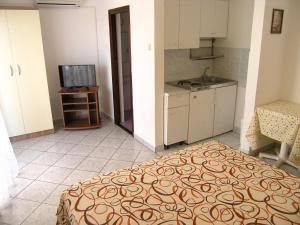 Kuchyň nebo kuchyňský kout v ubytování Apartments Murgic