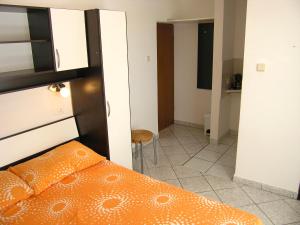 Postel nebo postele na pokoji v ubytování Apartments Murgic