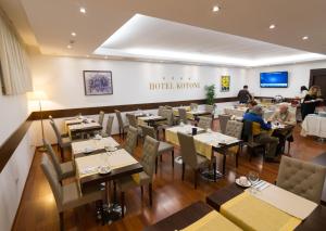 TV a/nebo společenská místnost v ubytování Boutique Hotel Kotoni