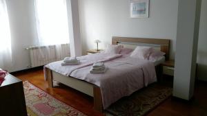 Postel nebo postele na pokoji v ubytování Apartment Krsmanovic
