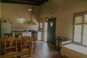 Η κουζίνα ή μικρή κουζίνα στο Cabañas La Cosecha