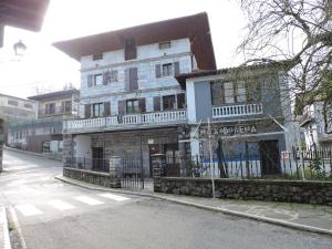 an old building on the side of a street at Matxinbeltzenea in Lesaka