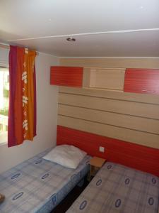 Postel nebo postele na pokoji v ubytování Camping du RIED