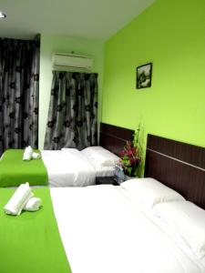 Letto o letti in una camera di ECO Hotel Putra Kajang