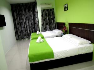Letto o letti in una camera di ECO Hotel Putra Kajang