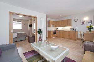 A kitchen or kitchenette at St Christopher's Place Serviced Apartments by Globe Apartments