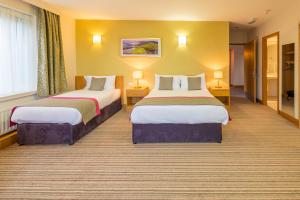 Krevet ili kreveti u jedinici u okviru objekta Knock House Hotel