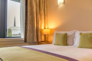 Krevet ili kreveti u jedinici u okviru objekta Knock House Hotel