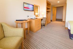 TV i/ili multimedijalni sistem u objektu Knock House Hotel