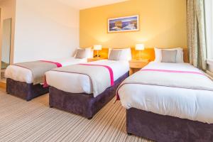 Krevet ili kreveti u jedinici u okviru objekta Knock House Hotel
