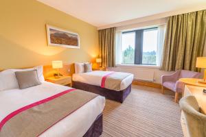 Krevet ili kreveti u jedinici u okviru objekta Knock House Hotel