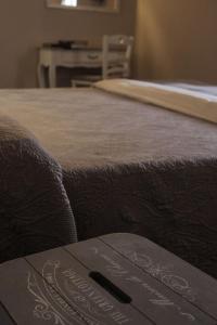 Posteľ alebo postele v izbe v ubytovaní B&B Il Senesino