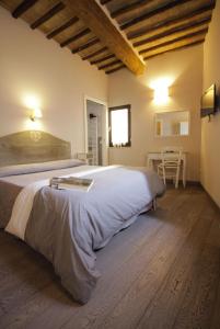 Posteľ alebo postele v izbe v ubytovaní B&B Il Senesino